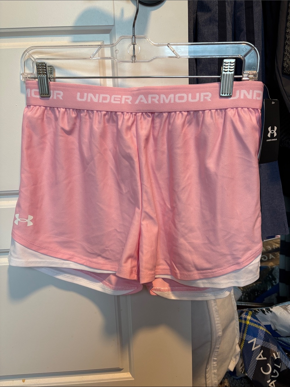 Under Armour Pink girl's Athletic Shorts with White Trim
